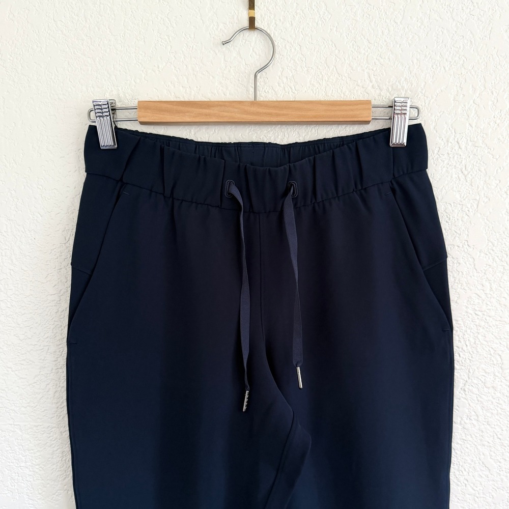 Lululemon On the Fly Crop True Navy Luxtreme Drawstring Pants Commuter Size 4 - Picture 6 of 14